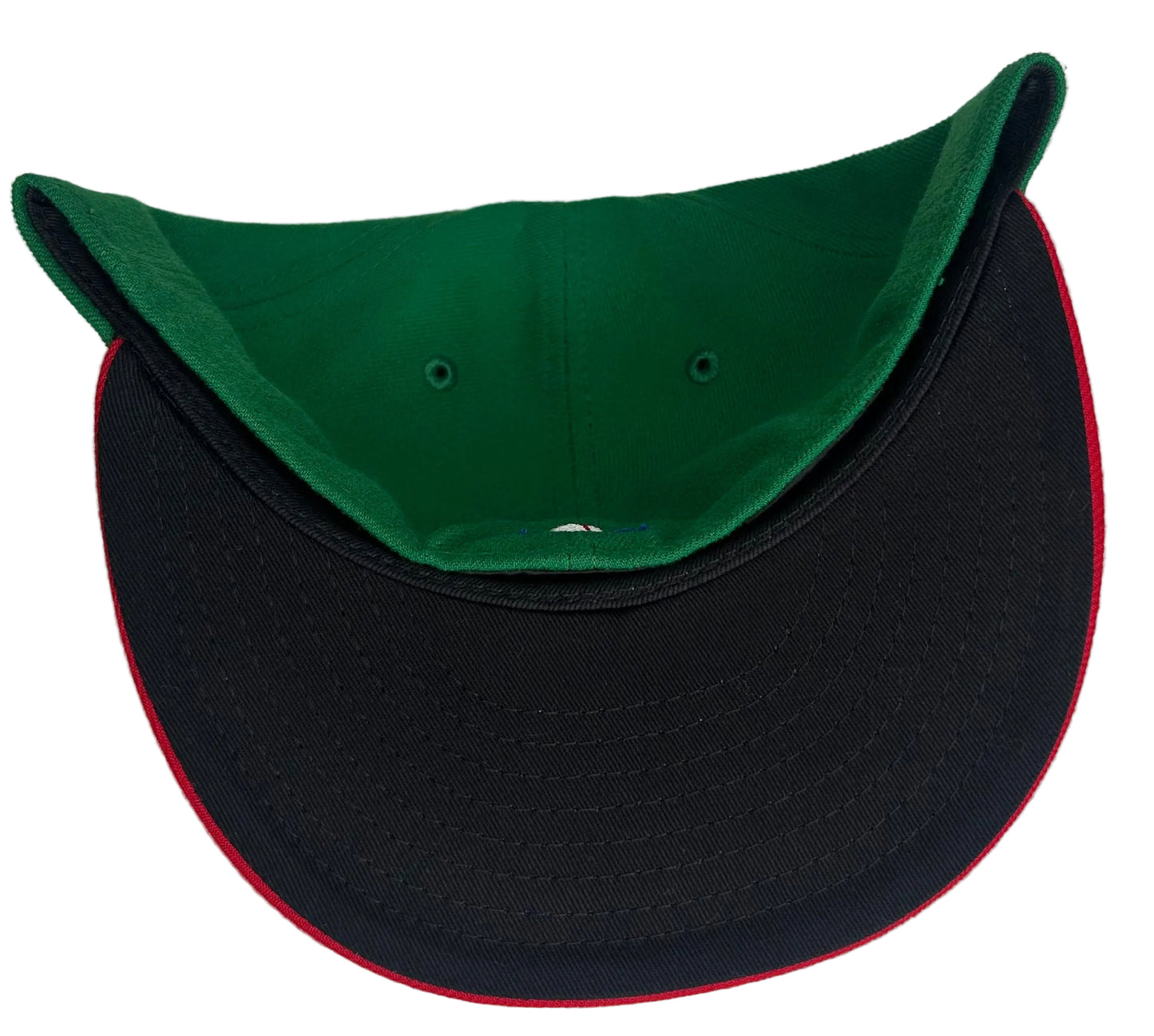 New Era 59FIFTY fitted cap features a vibrant green crown and a contrasting red visor with a white and red "M" logo for the Mexico Serie Del Caribe.