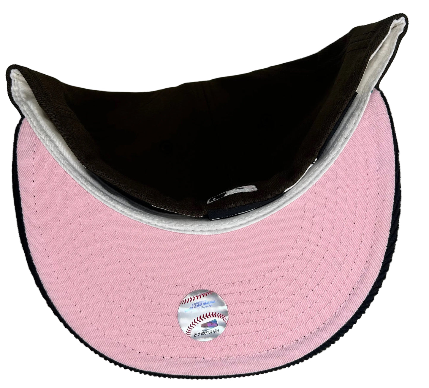 New Era Houston Astros 45th Anniversary fitted hat featuring a brown crown, a black corduroy visor, and a pink-accented side patch.