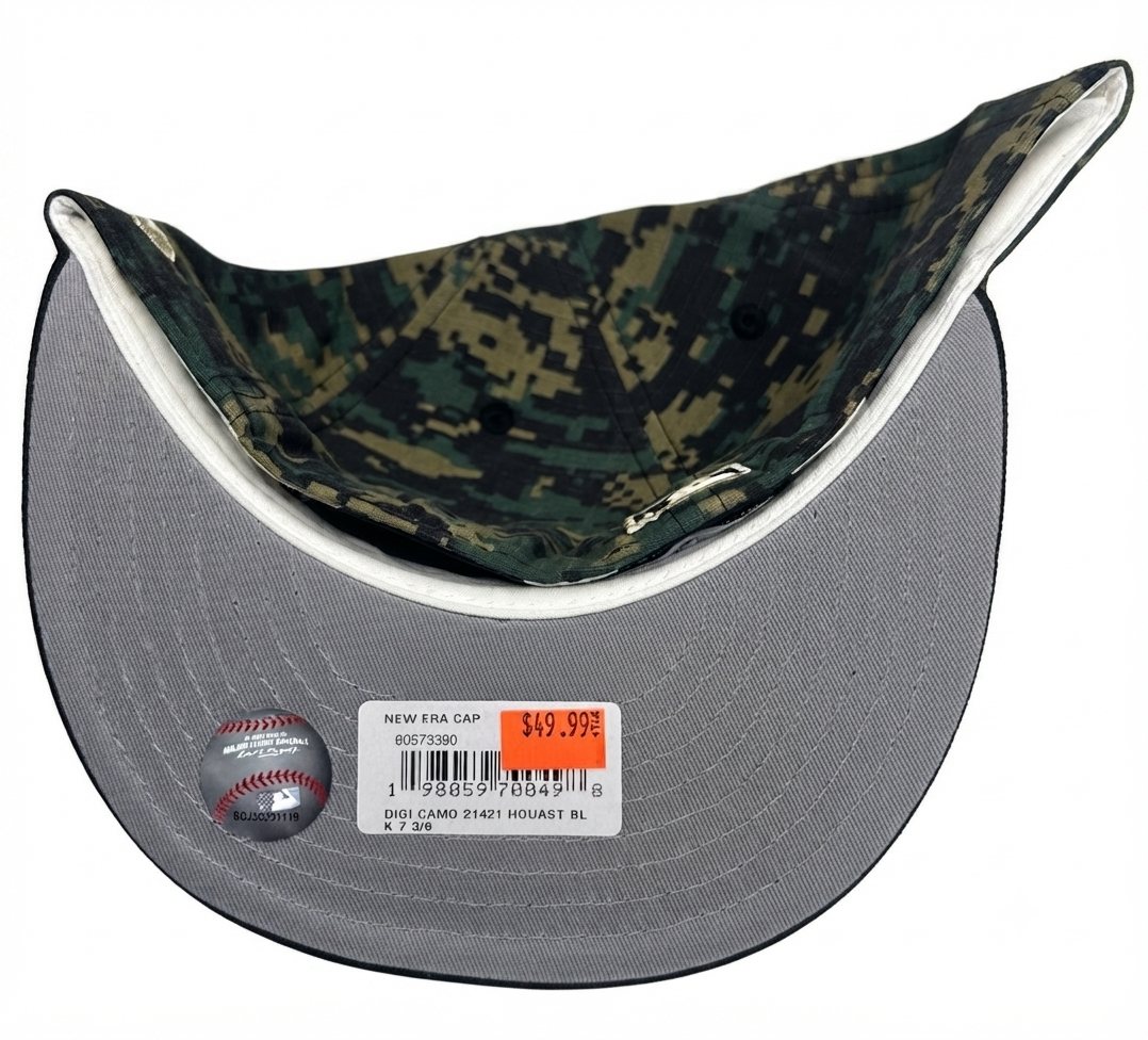 New Era Houston Astros 59FIFTY fitted hat from the 2024 MLB Armed Forces Day collection, featuring a camouflage pattern on the side panels and a gold embroidered team logo.