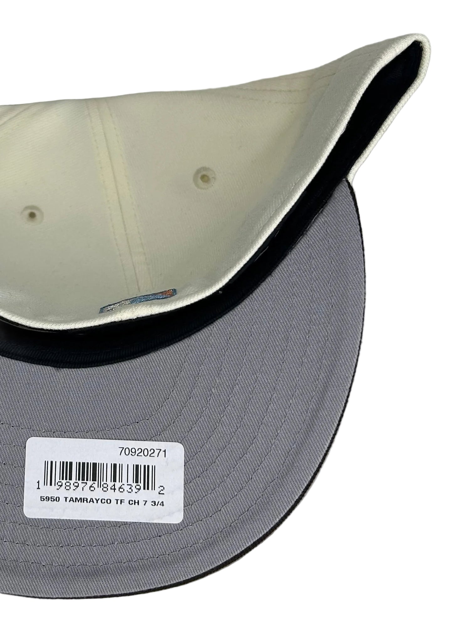 Tampa Bay Rays 59FIFTY fitted hat features a brown brim, cream crown, and a side patch of Tropicana Field.