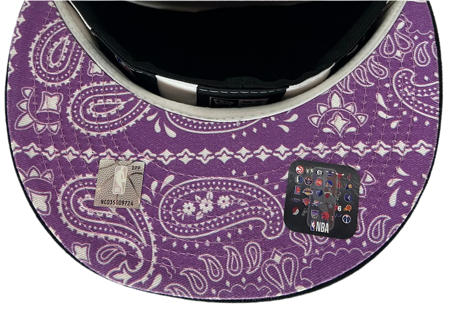 New Era 59FIFTY fitted cap featuring the Los Angeles Lakers logo in black, yellow, and purple W/ Purple Paisley UV.