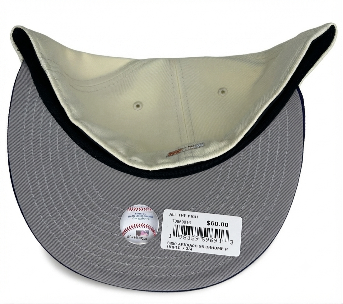 New Era Arizona Diamondbacks Cooperstown Collection 1998 Inaugural Season fitted hatfeaturing a prominent "D" snake logo and purple brim.