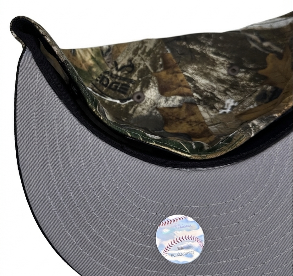 Atlanta Braves New Era MLB 59FIFTY fitted cap features a 2000 ASG SP Real Tree camouflage crown and a white logo.