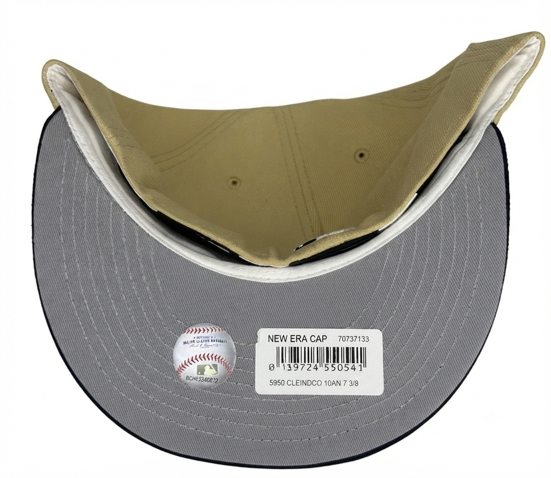 New Era Cleveland Indians 10th Anniversary Jacobs Field Vegas Two Tone Edition 59Fifty Fitted Cap features a striking metallic gold embroidered script logo.
