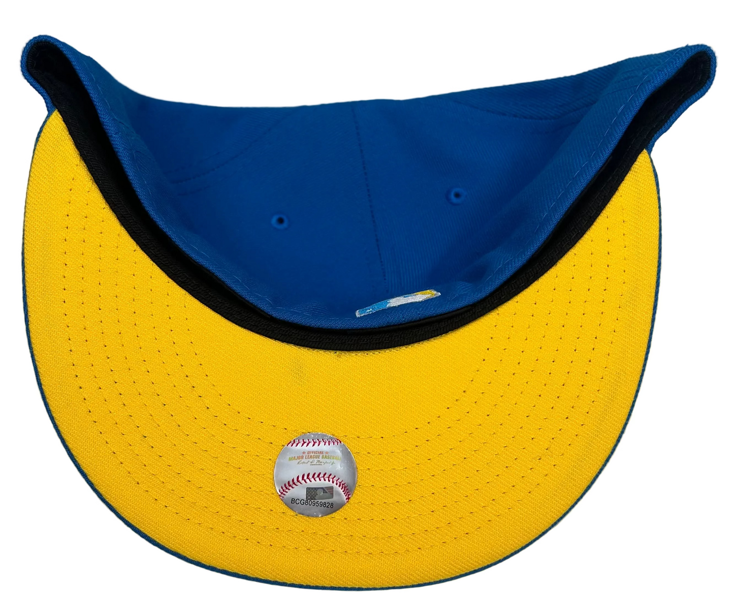 New Era Minnesota Twins Maggie Simpson Pack 59FIFTY fitted hat featuring a bright blue crown and a yellow interlocking 'M' logo inspired by The Simpsons.