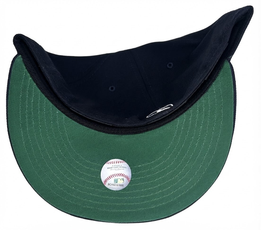 New York Yankees 100th Anniversary Spring Training Botanical 59FIFTY Fitted Hat featuring an embroidered white and green-trimmed team logo on the front and a colorful floral side patch.