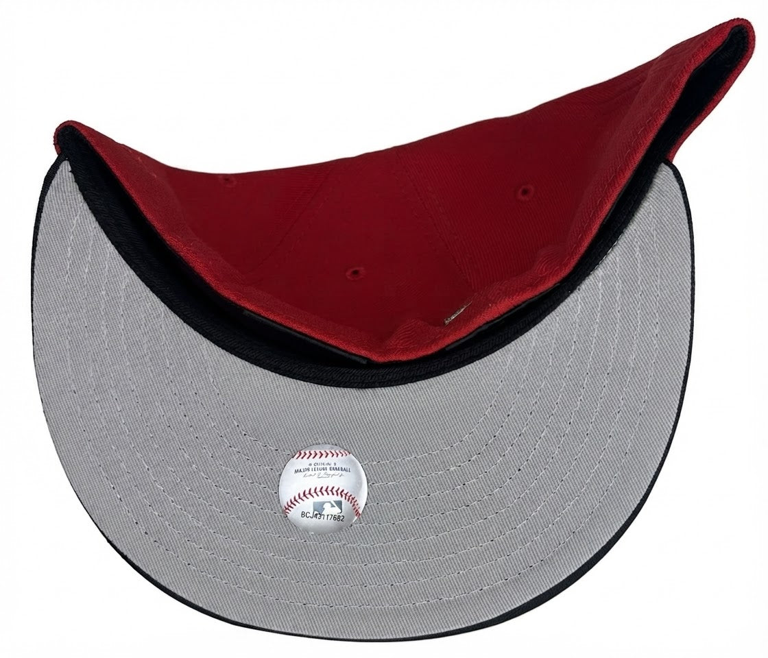 New Era 59FIFTY fitted hat for the Los Angeles Angels featuring a black tonal camo visor and a 50th-anniversary side patch.