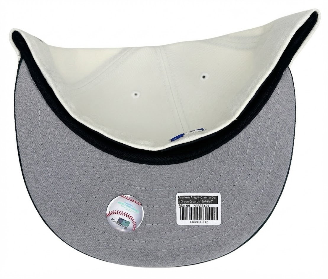 New Era Anaheim Angels W/ a 40th anniversary Patch 59FIFTY fitted hat featuring an off-white crown, a dark green brim, and a custom winged "A" logo.
