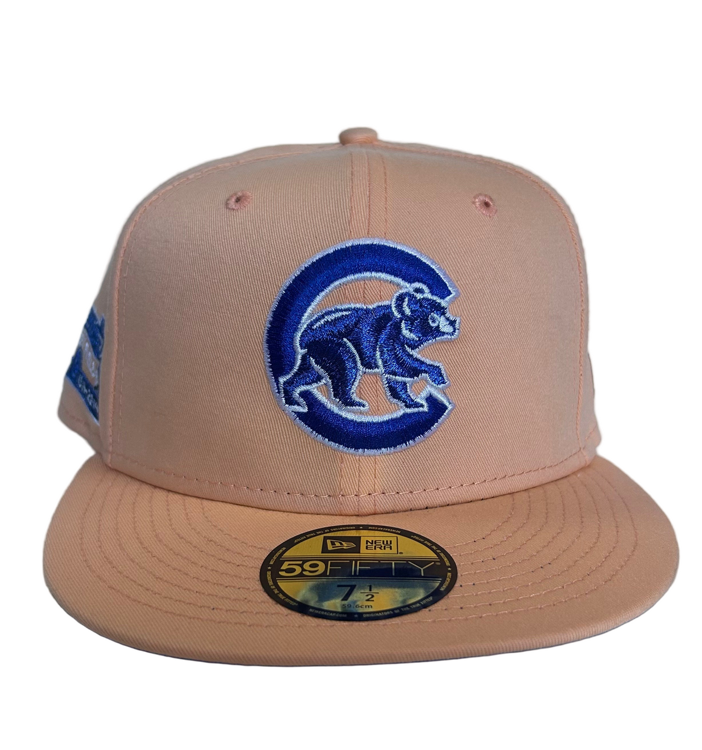 New Era Chicago Cubs 59FIFTY fitted hat in a peach/tan color with a side patch commemorating "100 Years at Wrigley Field 1914-2014”