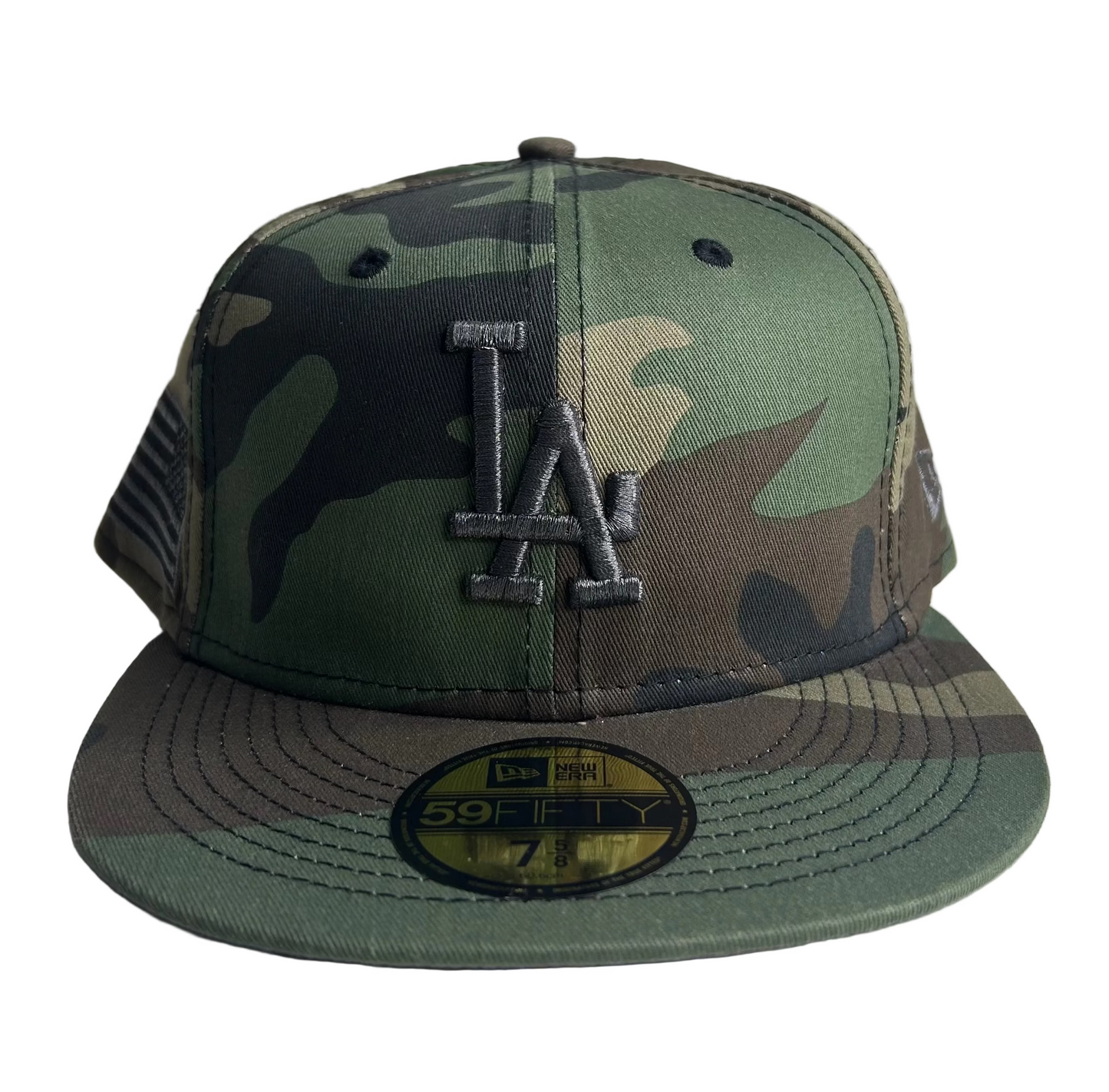 New Era 59FIFTY Los Angeles Dodgers fitted hat in a woodland camouflage pattern W/ side patch.