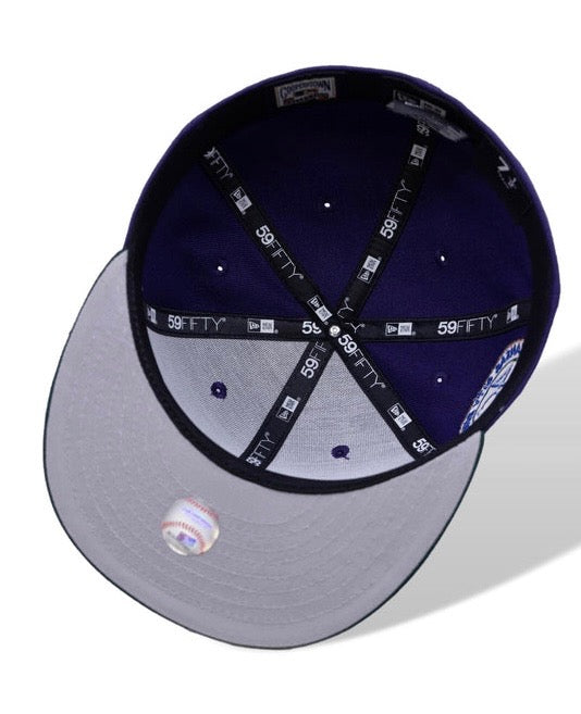 All The Right" Exclusive New Era "Rushmore" Kansas City Royals 59FIFTY fitted cap featuring a purple crown, green brim, and a 40th Anniversary side patch.