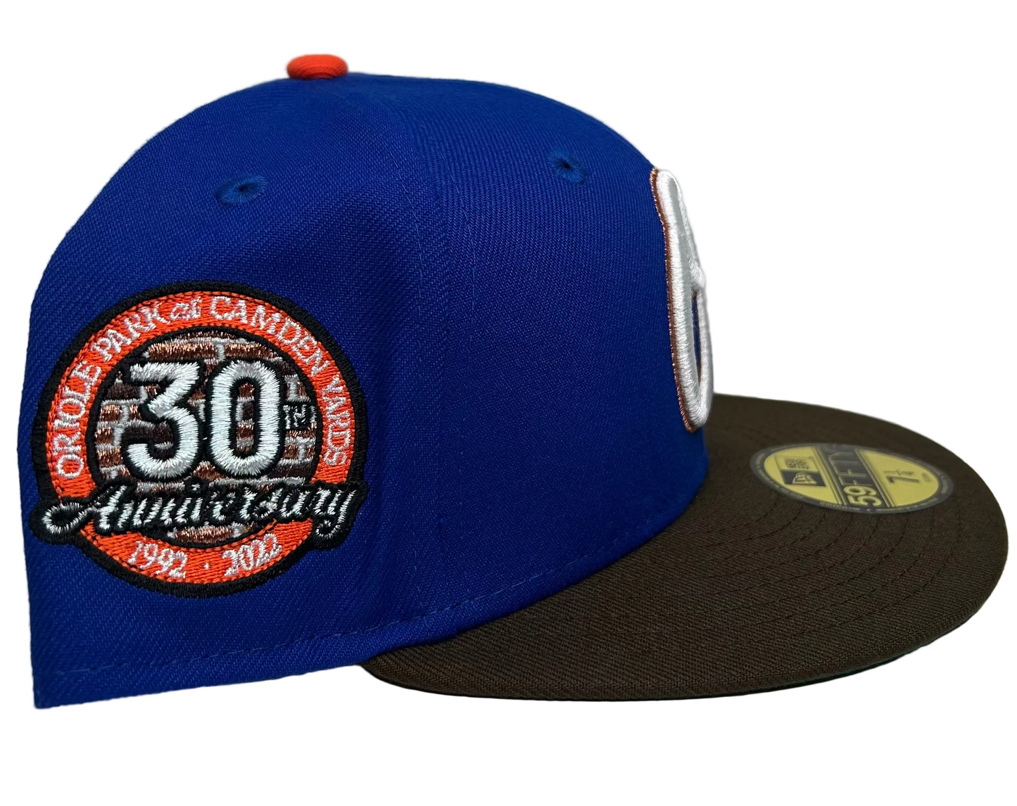 New Era Baltimore Orioles 2-Tone Royal Blue & Brown W/ Green UV 59FIFTY fitted hat featuring a 30th Anniversary side patch commemorating Camden Yards.