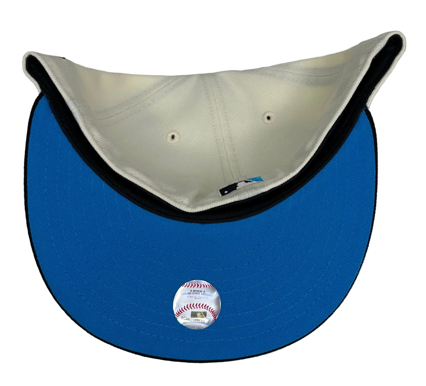 Miami Marlins New Era 59FIFTY Fitted Hat. It features the team's "MIAMI" wordmark logo in a vibrant multi-colored embroidery on the front.