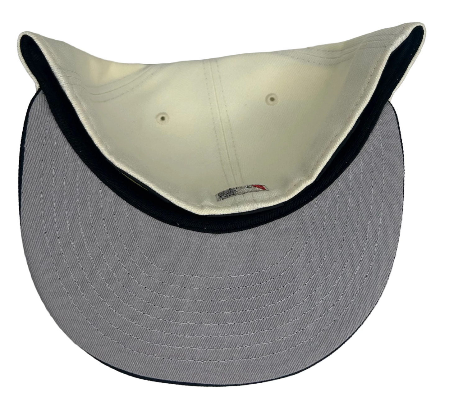 New Era Los Angeles Angels 59FIFTY fitted cap featuring a white "chrome" crown, a navy blue visor & commemorative side patch.