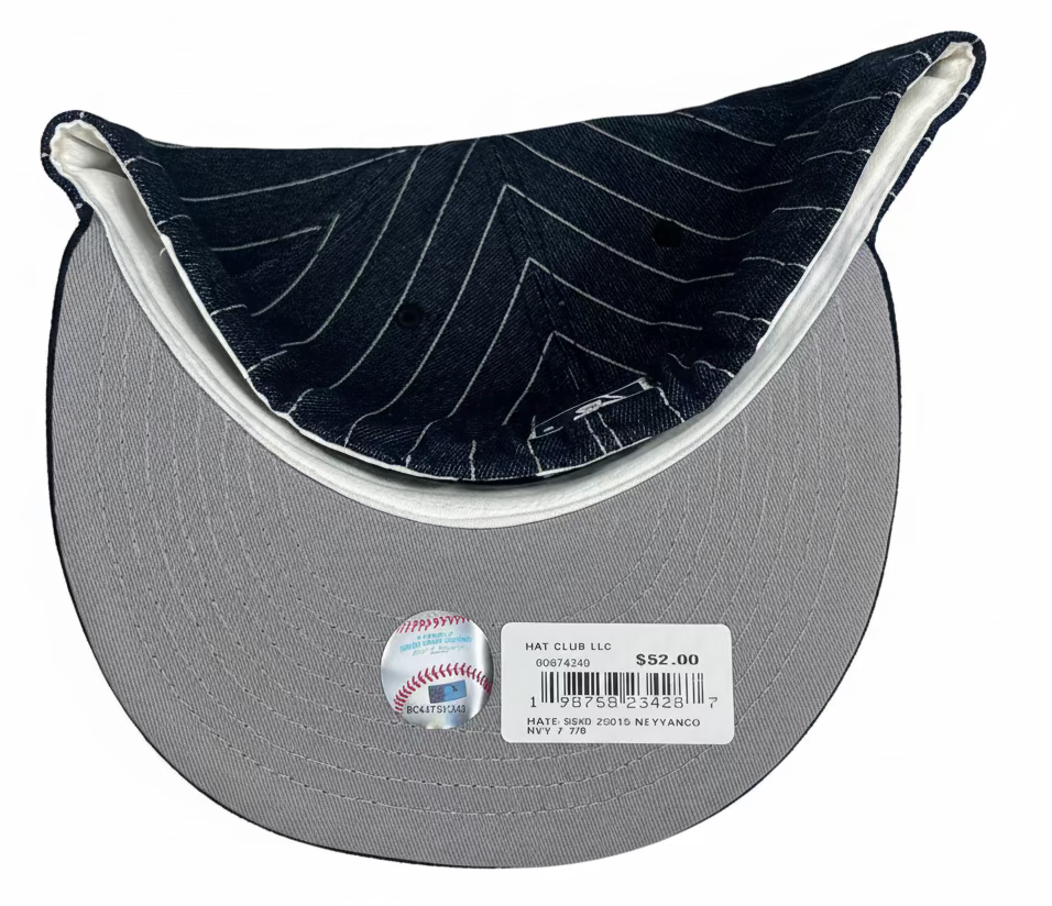 New Era 59FIFTY New York Yankees 1996 World Series Patch Fitted Hat in navy pinstripe denim.