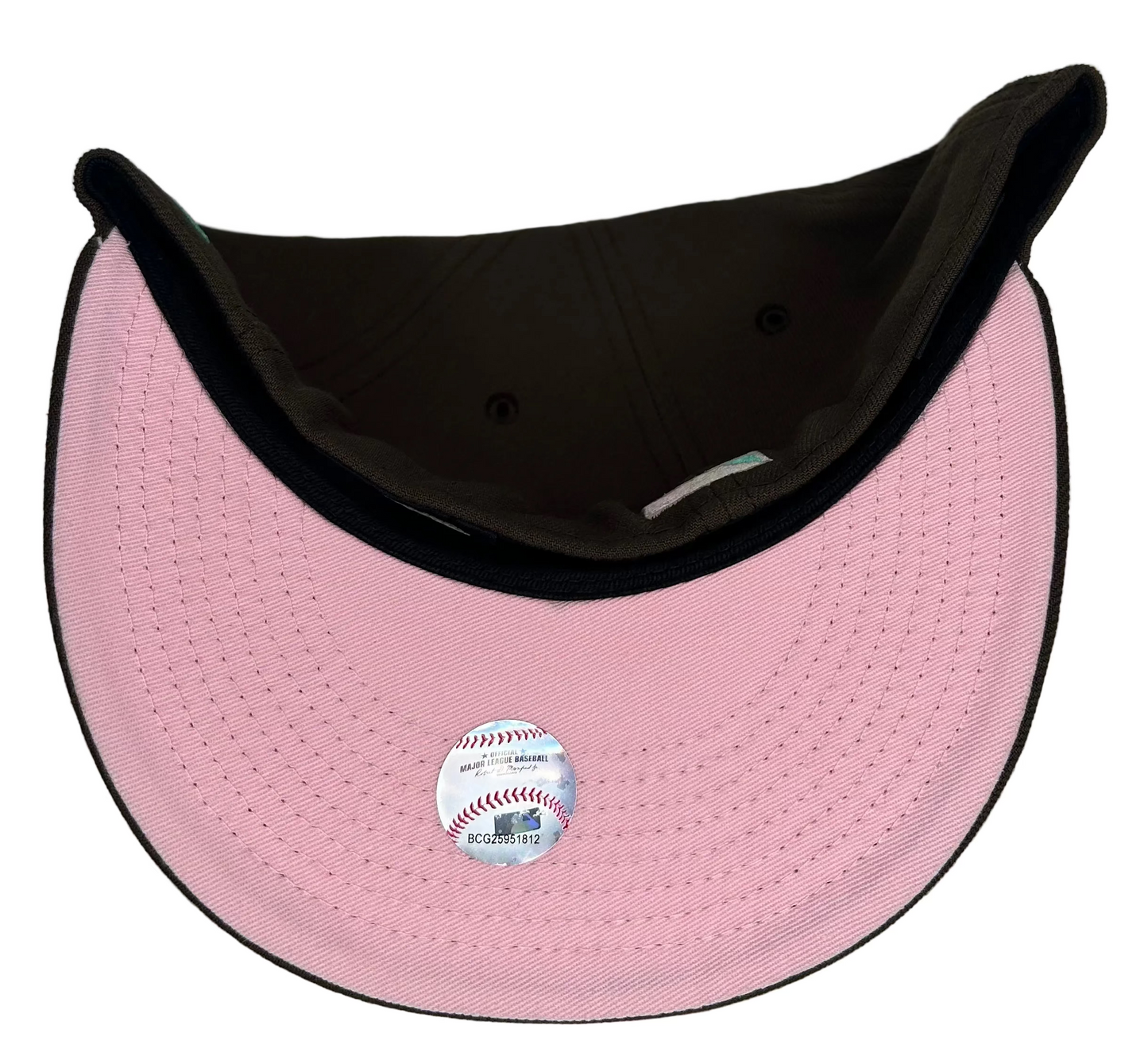 Chicago Cubs "Spumoni" New Era 59Fifty fitted hat, featuring a chocolate brown crown, black visor & pink undervisor.