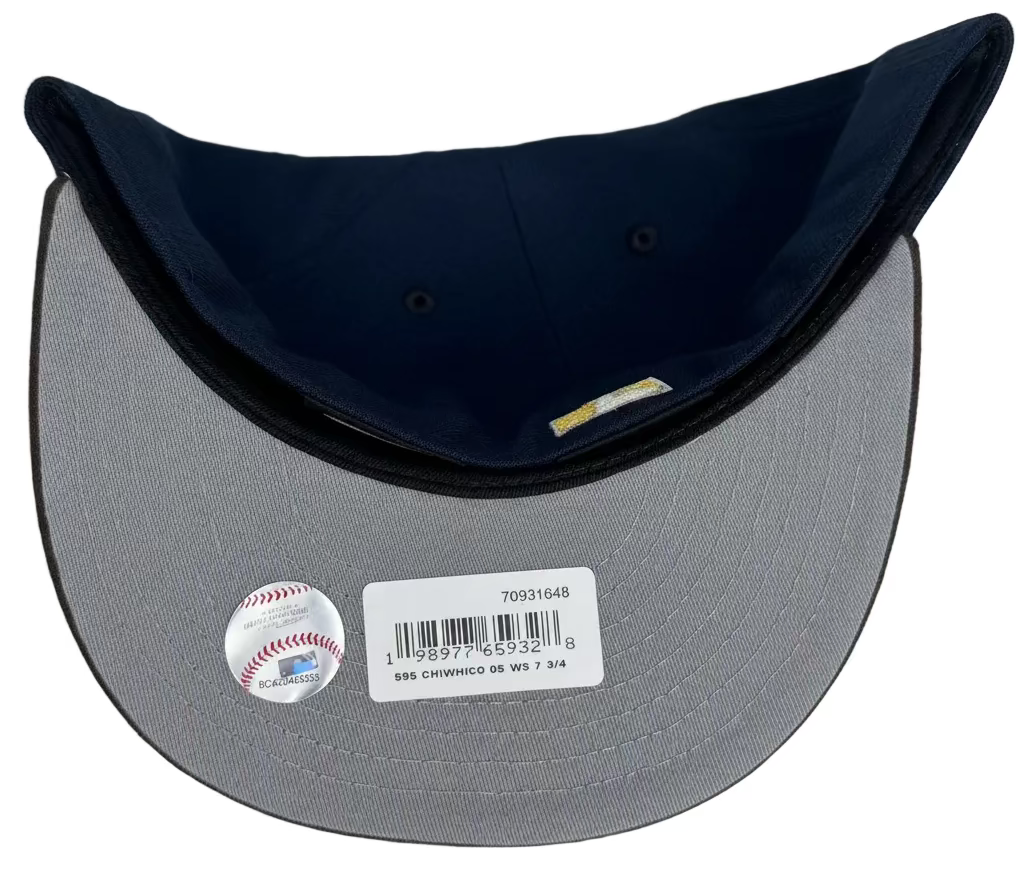 New Era Chicago White Sox 59FIFTY fitted hat with a navy blue crown, brown visor, and a gold World Series side patch.