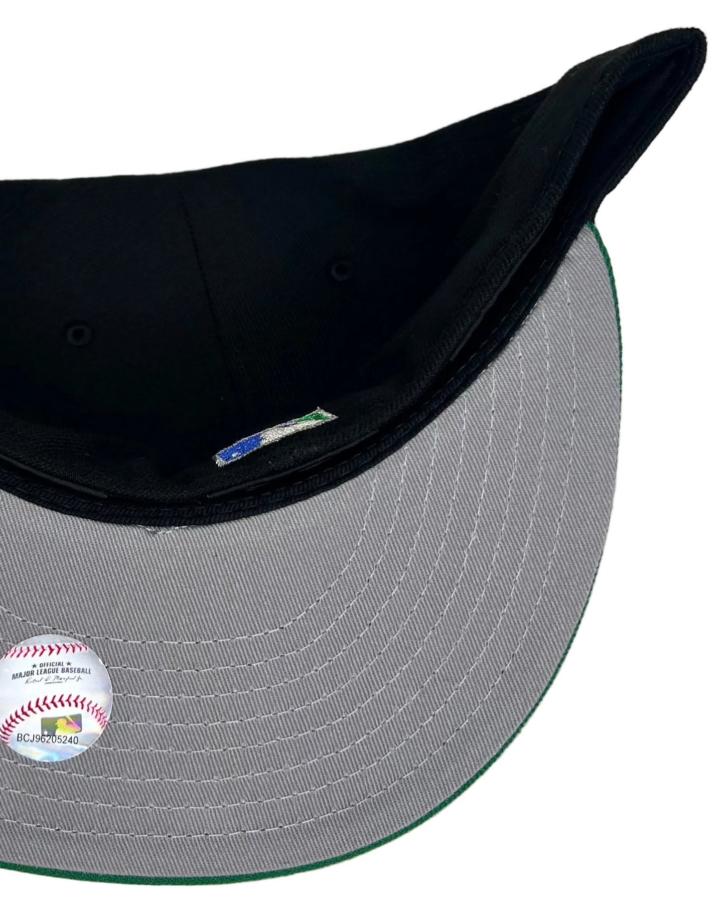 New Era 59FIFTY Tampa Bay Devil Rays fitted cap with a black crown and green visor.