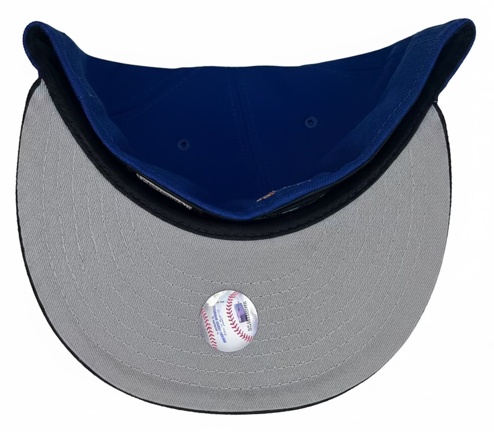 New Era Baltimore Orioles 59FIFTY fitted hat with a blue crown, black visor, and a special anniversary side patch.