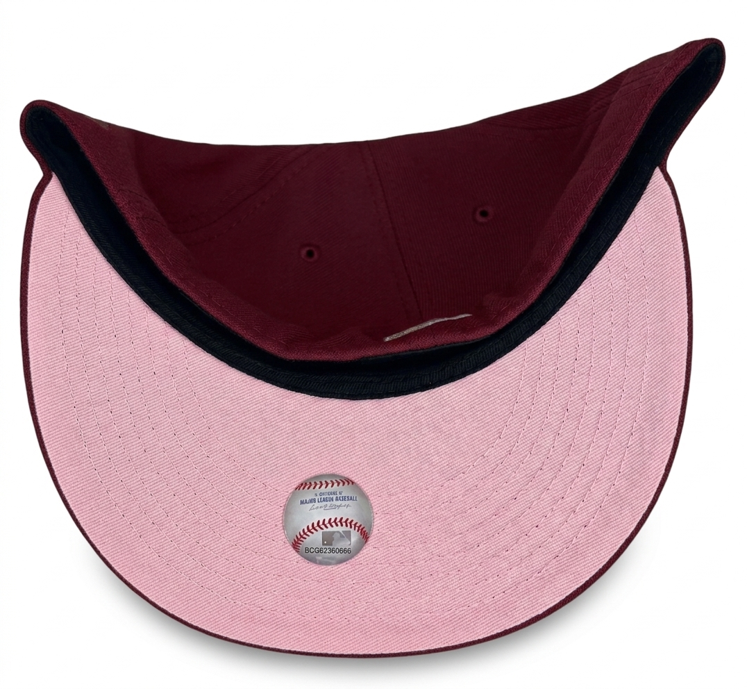 New Era Arizona Diamondbacks 59FIFTY fitted hat features a maroon crown and a prominent inaugural season side patch.