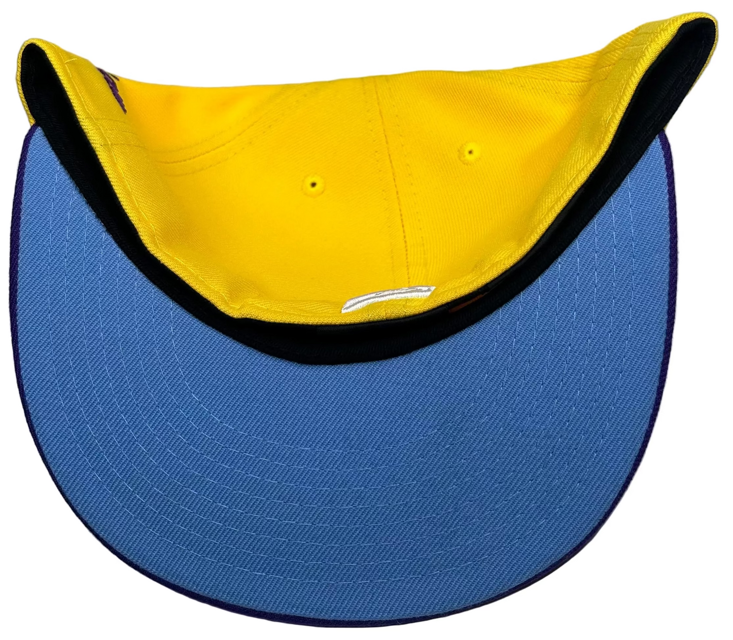 New Era 59FIFTY hat is a Los Angeles Dodgers fitted cap featuring a purple and yellow "Crossover" color.