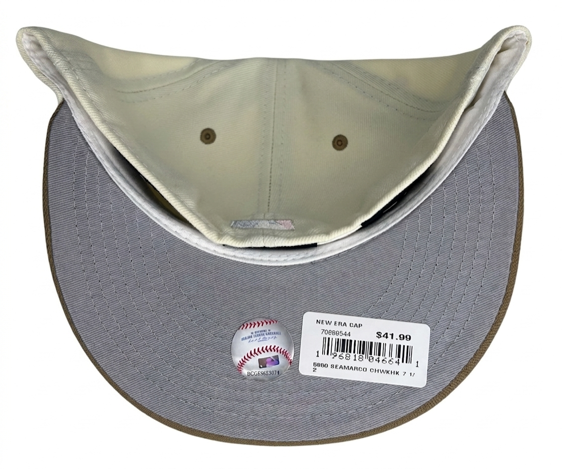 New Era Seattle Mariners 59FIFTY fitted hat featuring a two-tone design with a cream crown and a brown visor.