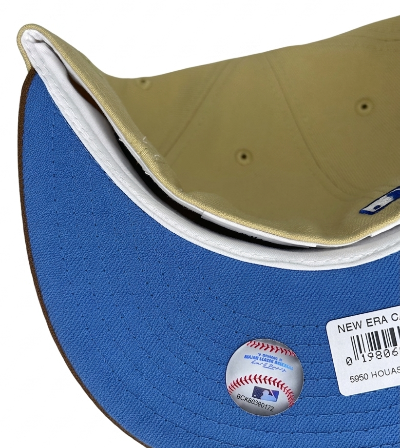 New Era Houston Astros “Toys R Us” W/ a 2022 World Series fitted cap features a khaki crown and a brown visor.