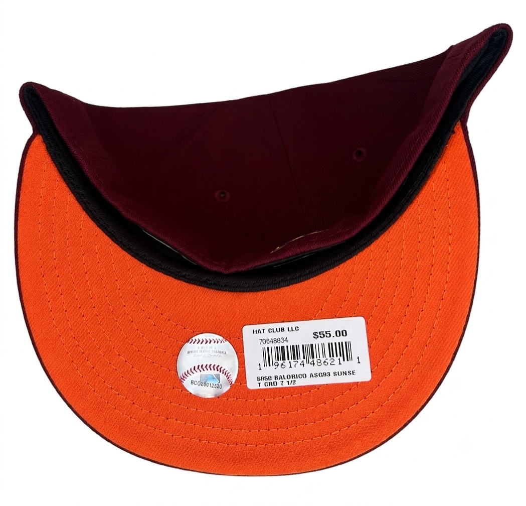 New Era Baltimore Orioles 59Fifty fitted hat featuring a maroon crown, a bright orange visor, and a custom side patch celebrating the 50th Anniversary.