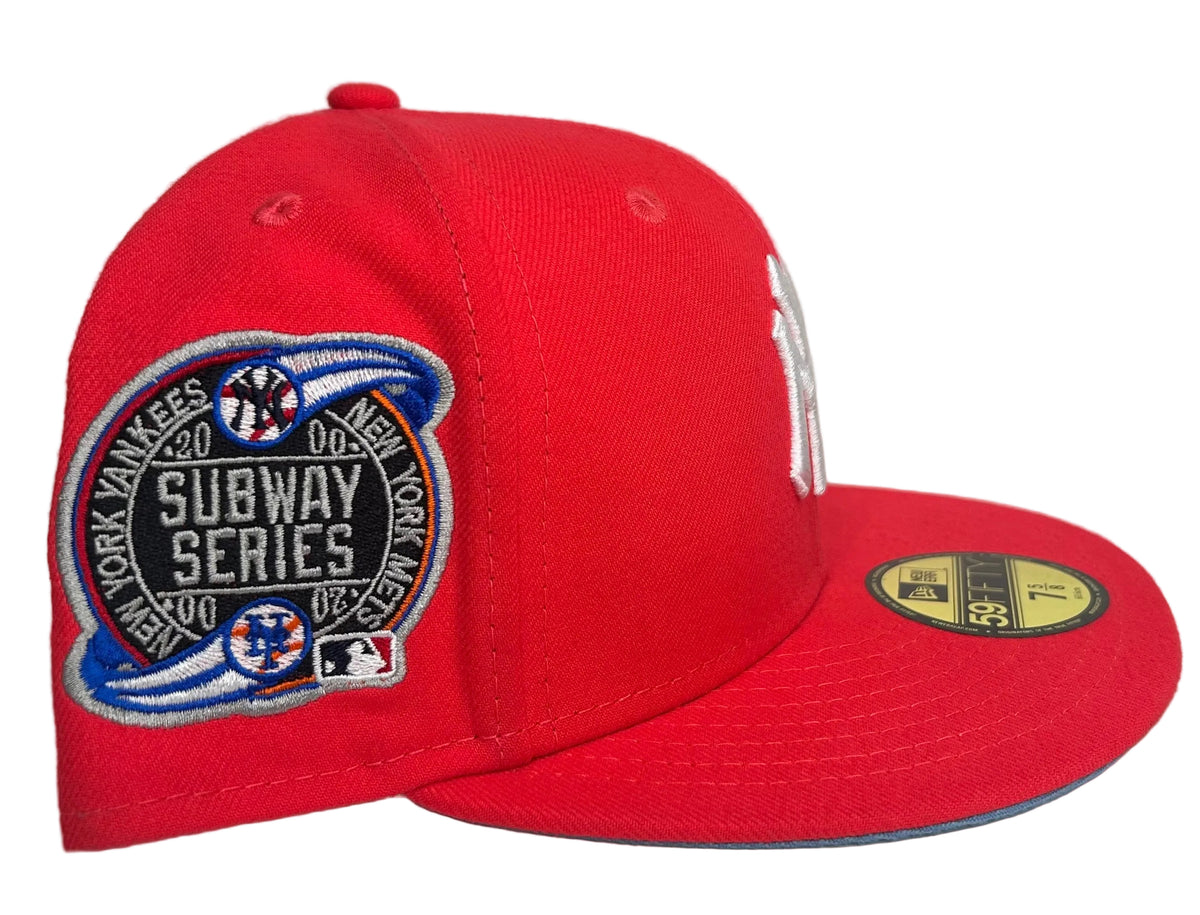 This New Era New York Yankees Subway Series 2000 Red fitted hat features a blue undervisor.