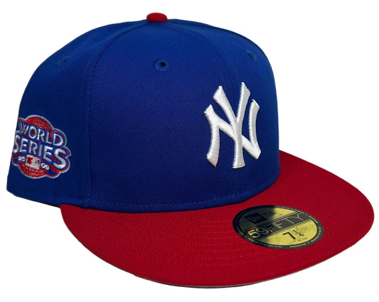 New Era 59FIFTY New York Yankees fitted hat featuring a royal blue crown, red flat visor, and a commemorative World Series side patch.