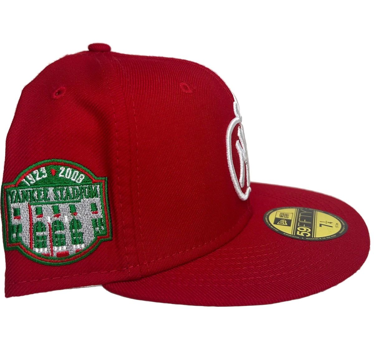 New Era New York Yankees 59Fifty Fitted Hat featuring a unique red "Big Apple" & a Yankees Stadium SP.