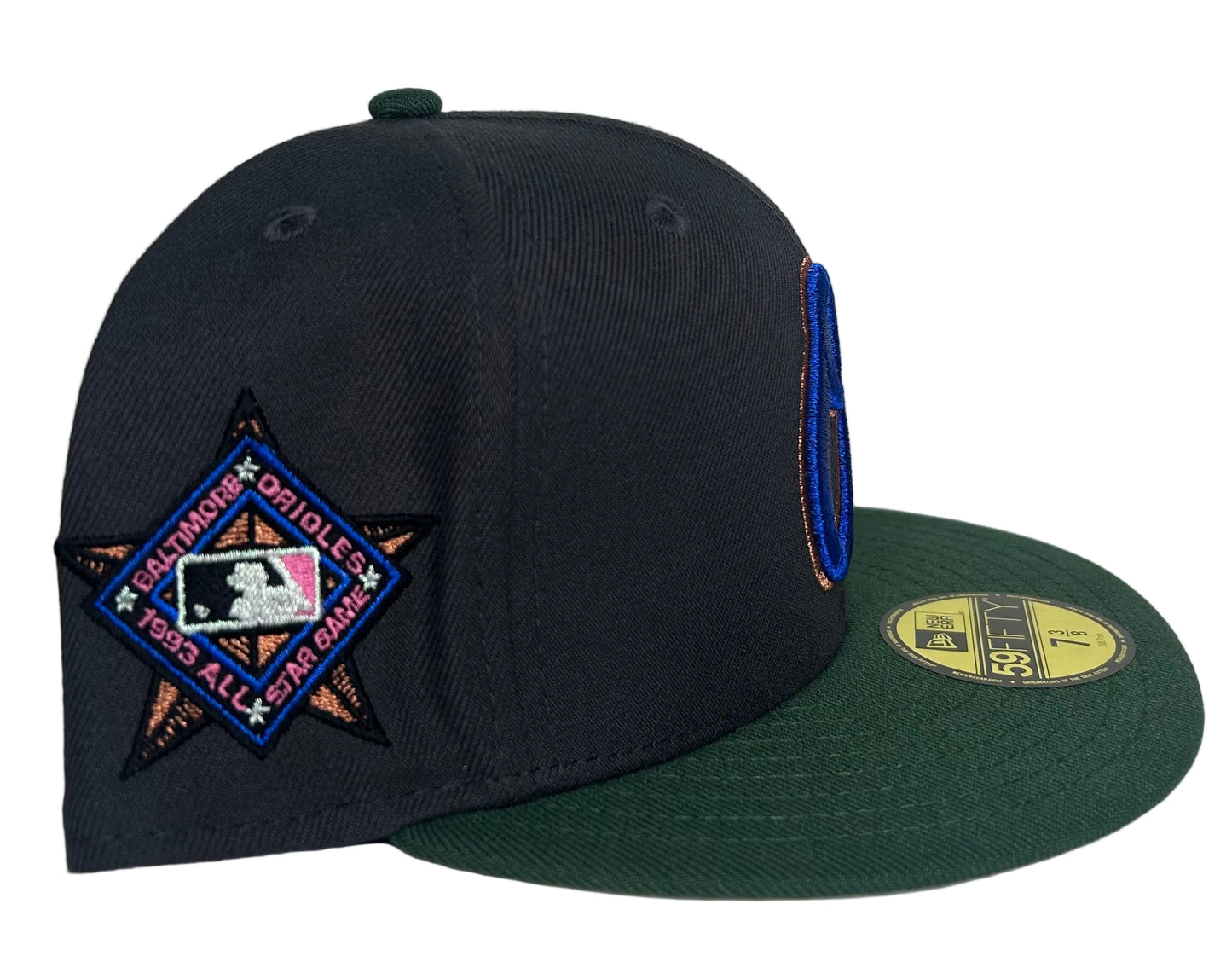 New Era Hatstore Exclusive x Baltimore Orioles 59FIFTY fitted hat featuring a metallic blue and copper logo.
