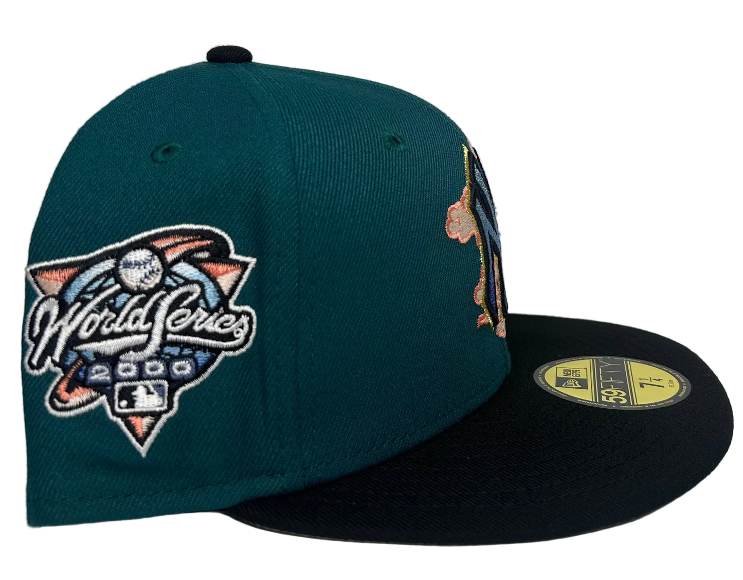 New Era New York Yankees Cloud Spiral 2000 World Series 59FIFTY Fitted Hat featuring a turquoise green crown, black brim, and distinctive embroidered cloud and gradient logo details.