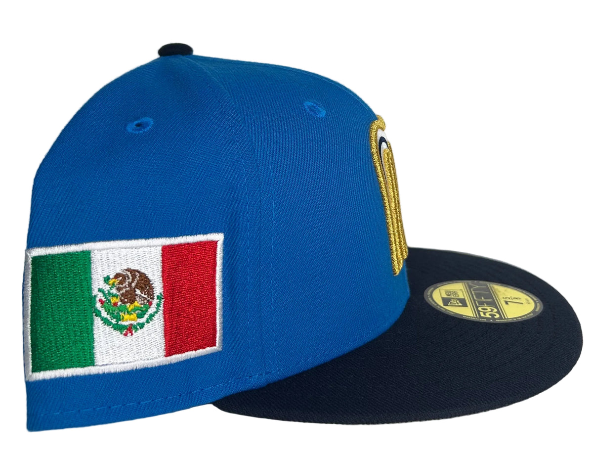 Mexico 2023 World Baseball Classic New Era 59Fifty fitted hat in a blue and navy colorway with a side flag patch.