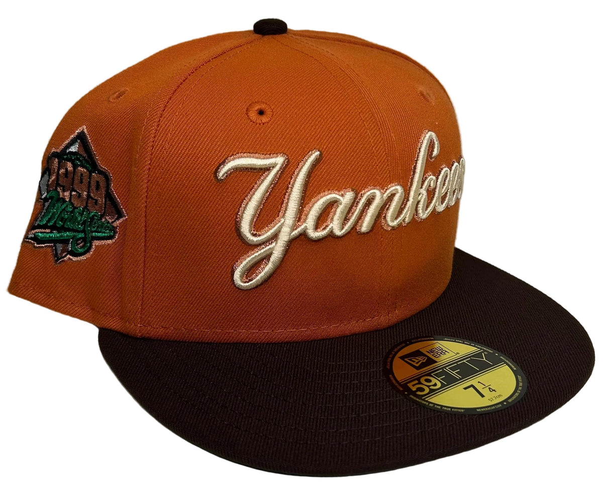 New York Yankees rust and walnut brown 59FIFTY featuring a cursive team script and a 1999 World Series side patch.