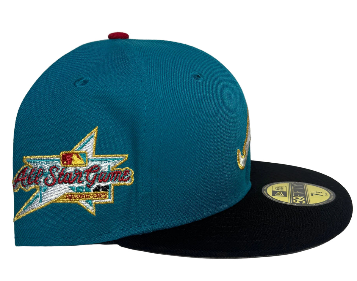New Era 59FIFTY Atlanta Braves fitted hat Teal/ Black features a metallic gold and white embroidered "A" logo alongside a commemorative side patch.