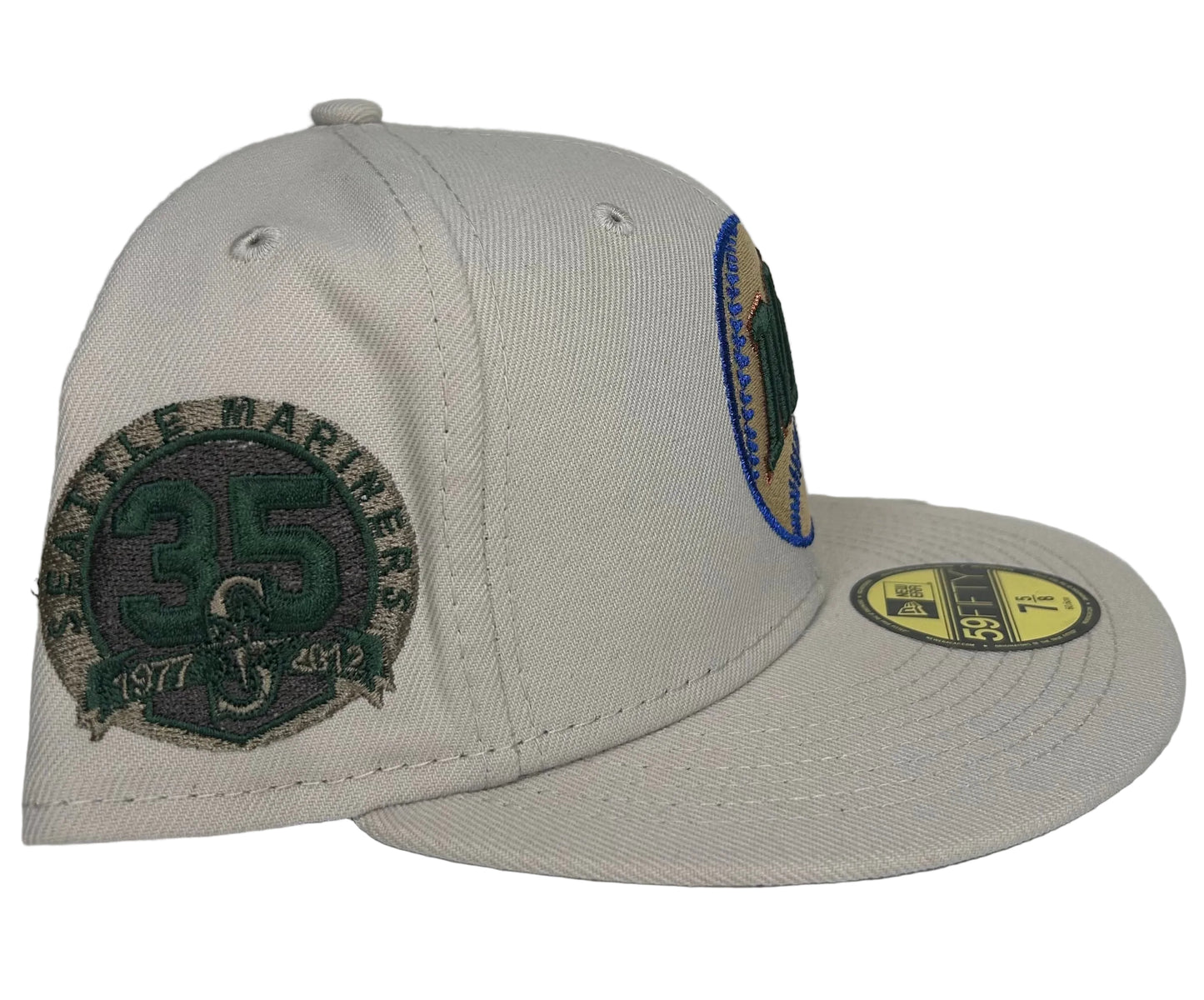 Seattle Mariners 59FIFTY fitted hat by New Era features a "Money Ball" colorway with a 35th-anniversary patch.