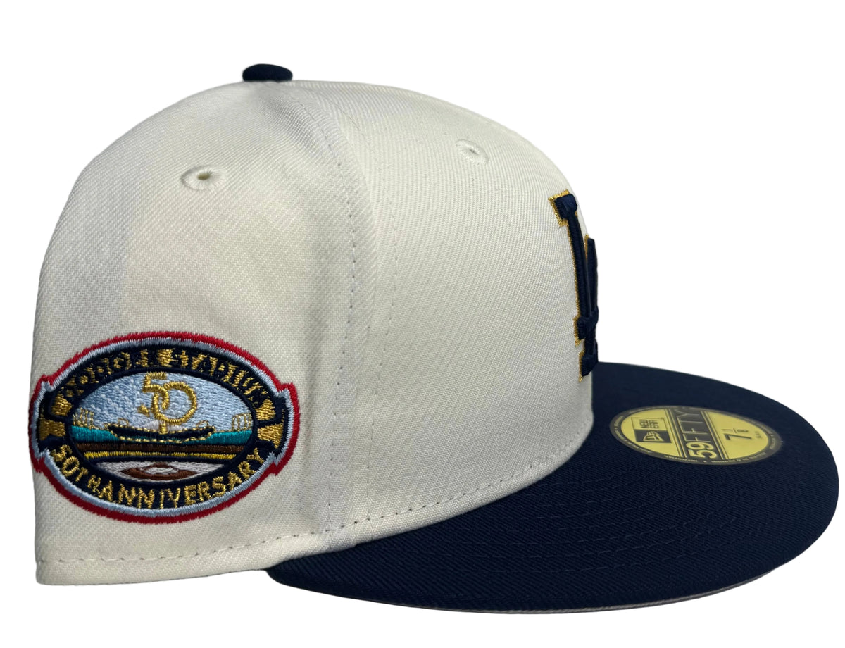 New Era 59FIFTY Los Angeles Dodgers 50th Anniversary fitted hat featuring an off-white crown and a navy visor.