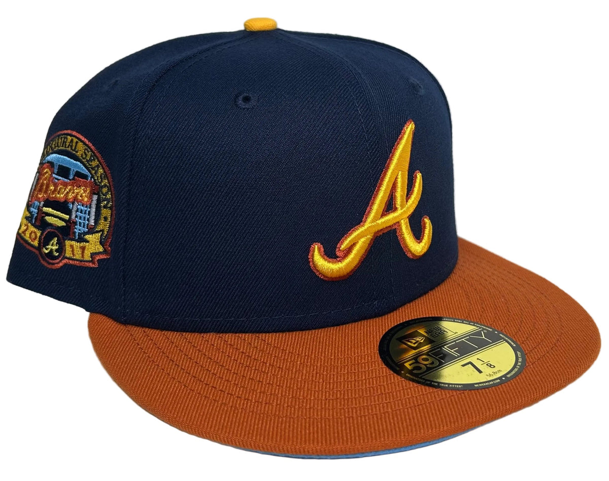 Atlanta Braves 59FIFTY Fitted Hat New Era, featuring a navy crown, orange brim, and a 2000 All-Star Game side patch.