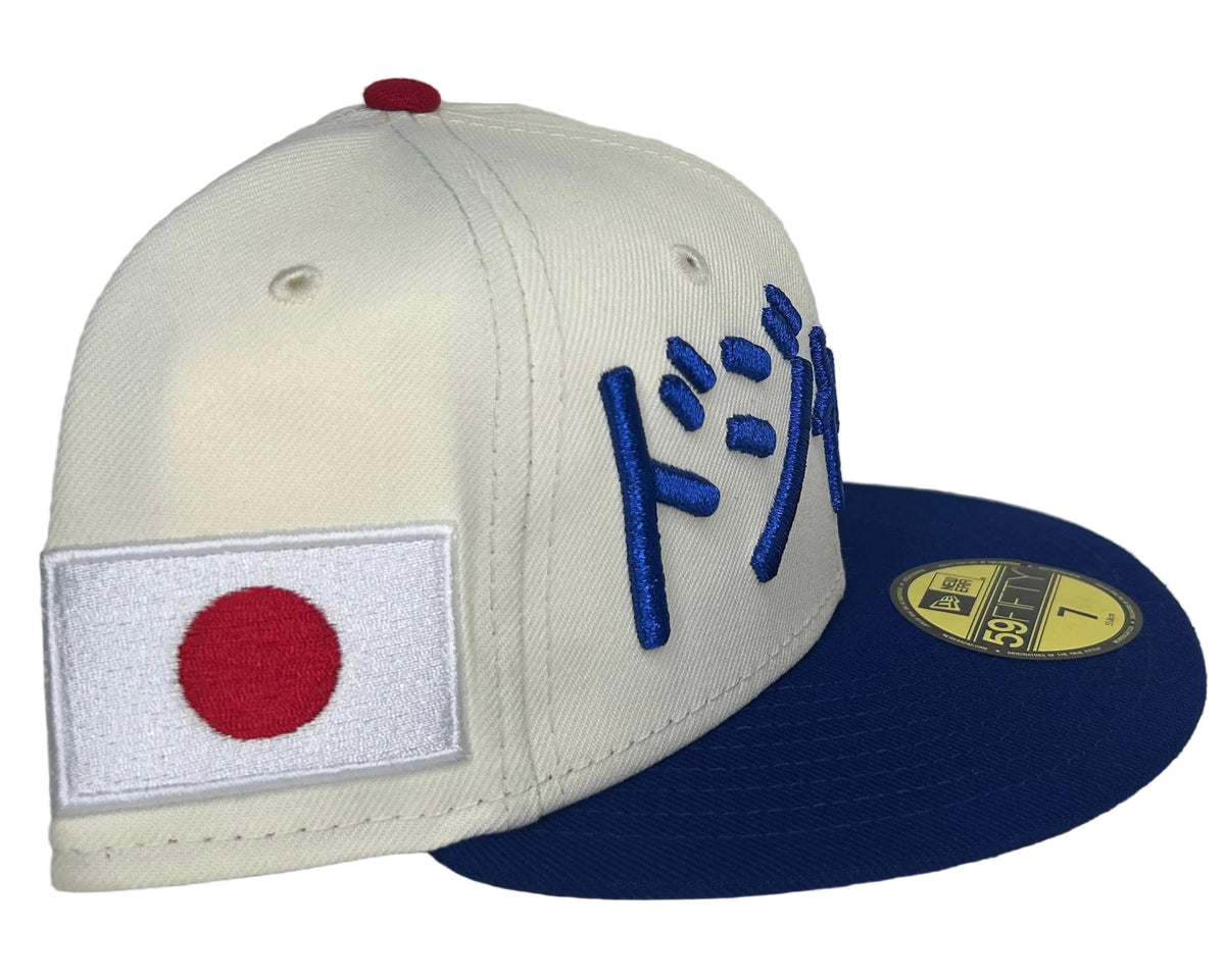 New Era Los Angeles Dodgers 'Japan Pack' Kanji 59Fifty features vibrant blue Kanji embroidery across a cream-colored crown.