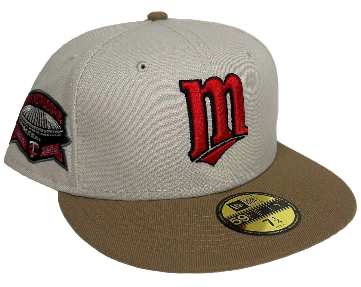 Minnesota Twins New Era 59FIFTY fitted hat features an off-white/grey crown, a tan flat brim, and a Hubert H. Humphrey Metrodome 1982–2009 side patch.