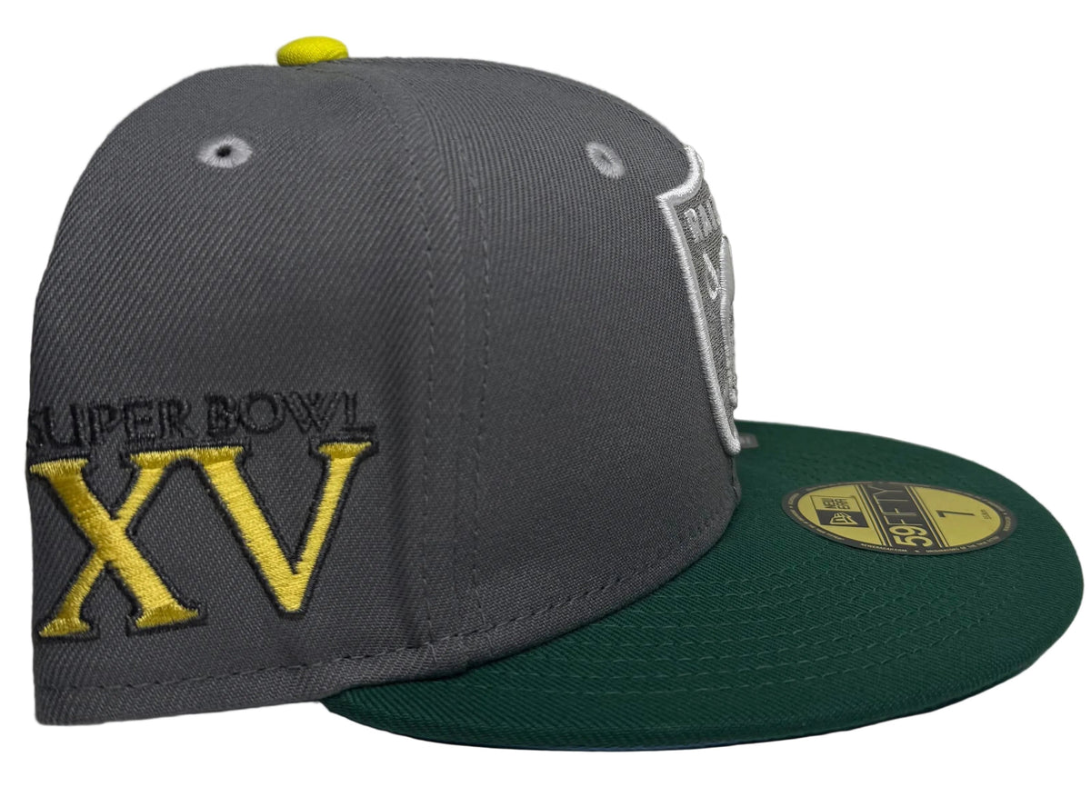 Gray & Green New Era 59FIFTY Las Vegas Raiders fitted Hat features a prominent team shield logo on the front and a Super Bowl side patch.