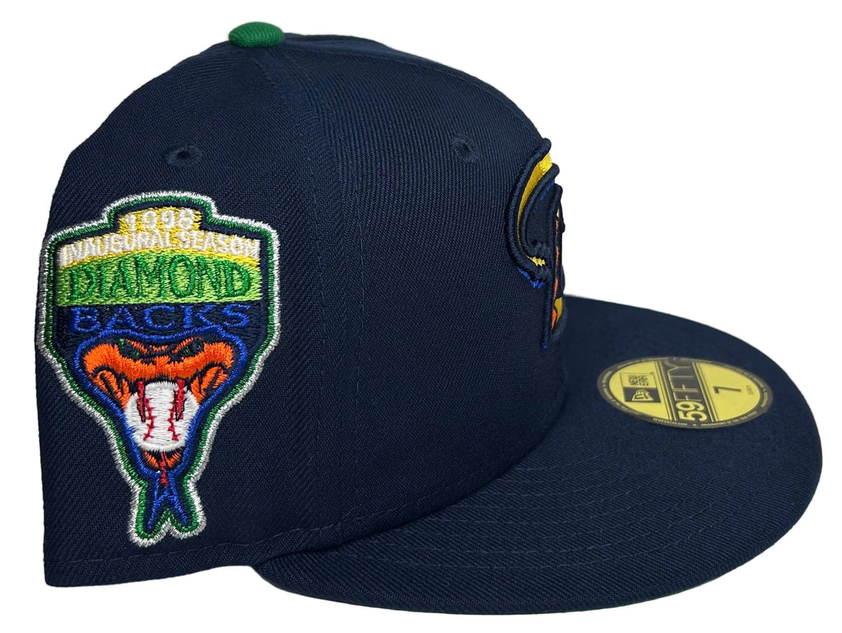 New Era Arizona Diamondbacks "Digimon” Oceanside Blue 59FIFTY fitted hat featuring a yellow and red snake 'D' logo and a 1998 inaugural side patch
