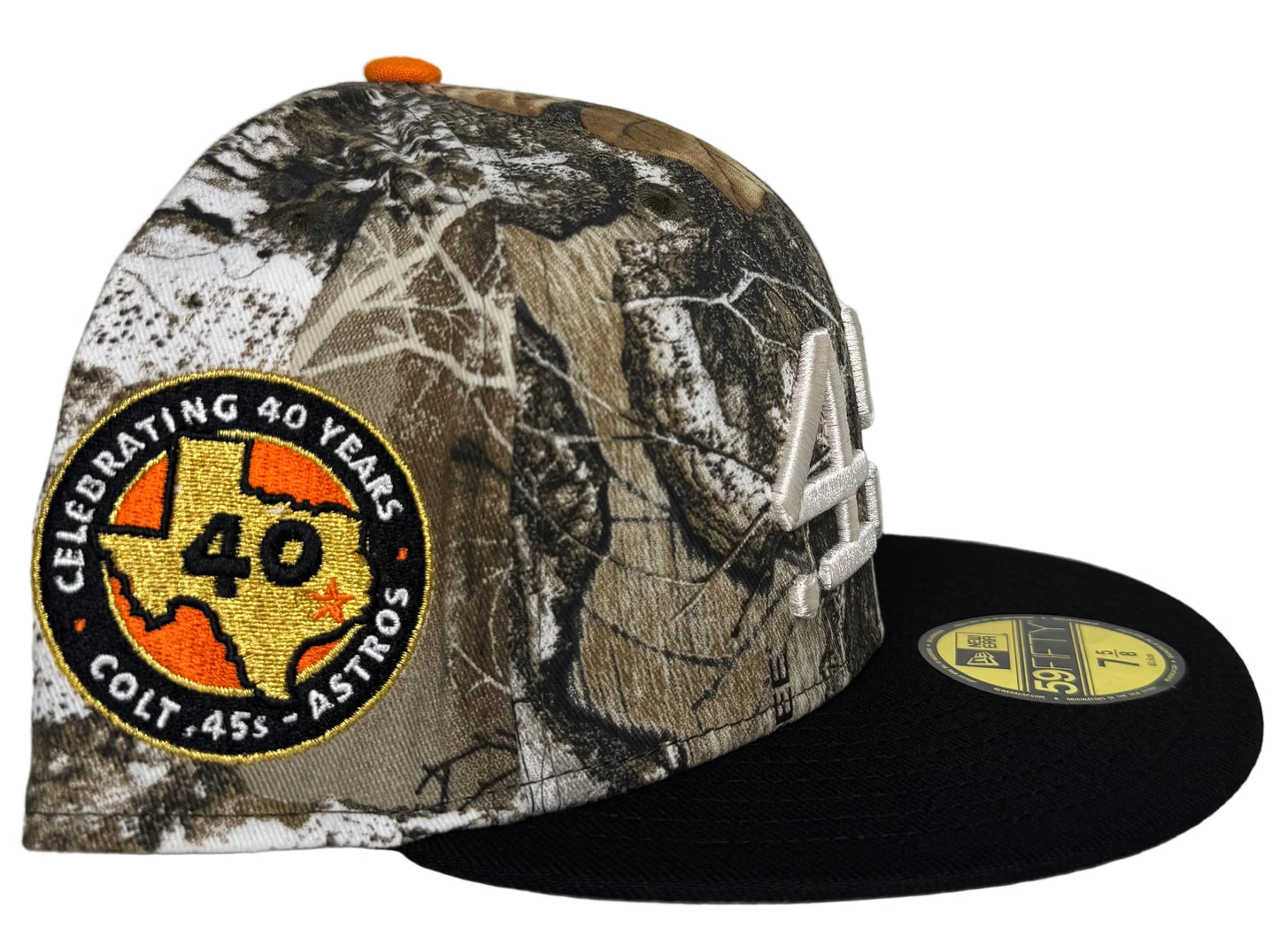 New Era 59Fifty fitted hat features a Realtree camo crown, a navy blue brim, and a special patch celebrating 40 years of the Houston Colt .45s
