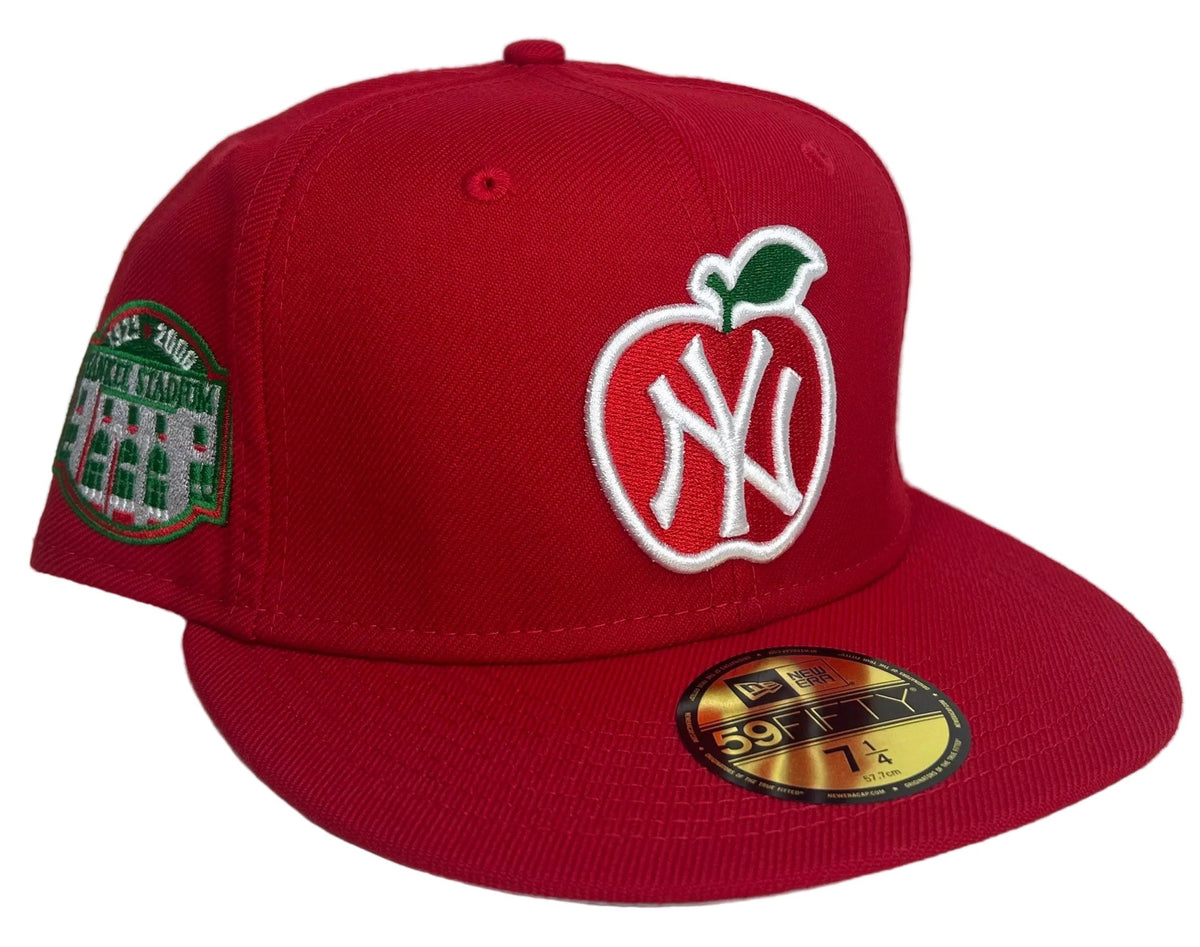New Era New York Yankees 59Fifty Fitted Hat featuring a unique red "Big Apple" & a Yankees Stadium SP.