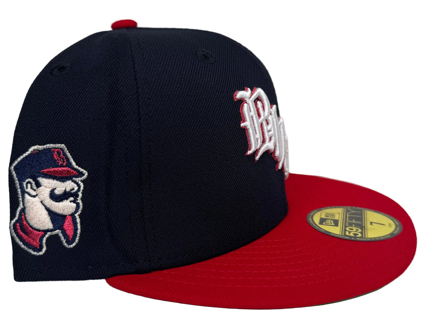 New Era Birmingham Barons Navy Throwback Two Tone Edition 59Fifty Fitted Hat featuring a navy crown, a red flat brim, and an old English "Bham" script embroidery on the front.