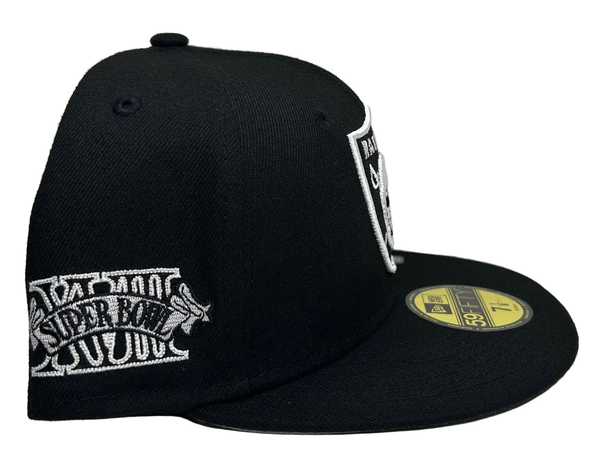 New Era 59FIFTY Las Vegas Raiders Fitted Hat featuring a Super Bowl XVIII side patch, stylized in a sleek black and white embroidered design.