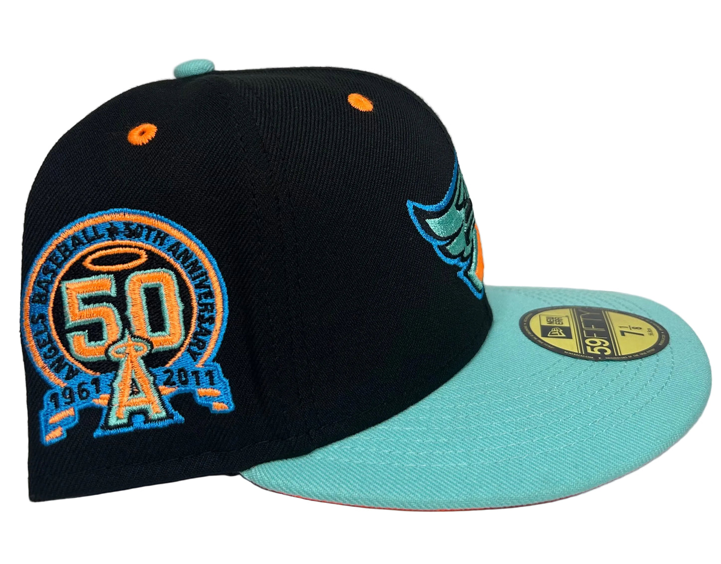 New Era Anaheim Angels 50th Anniversary fitted cap featuring a black crown and a distinct teal brim.