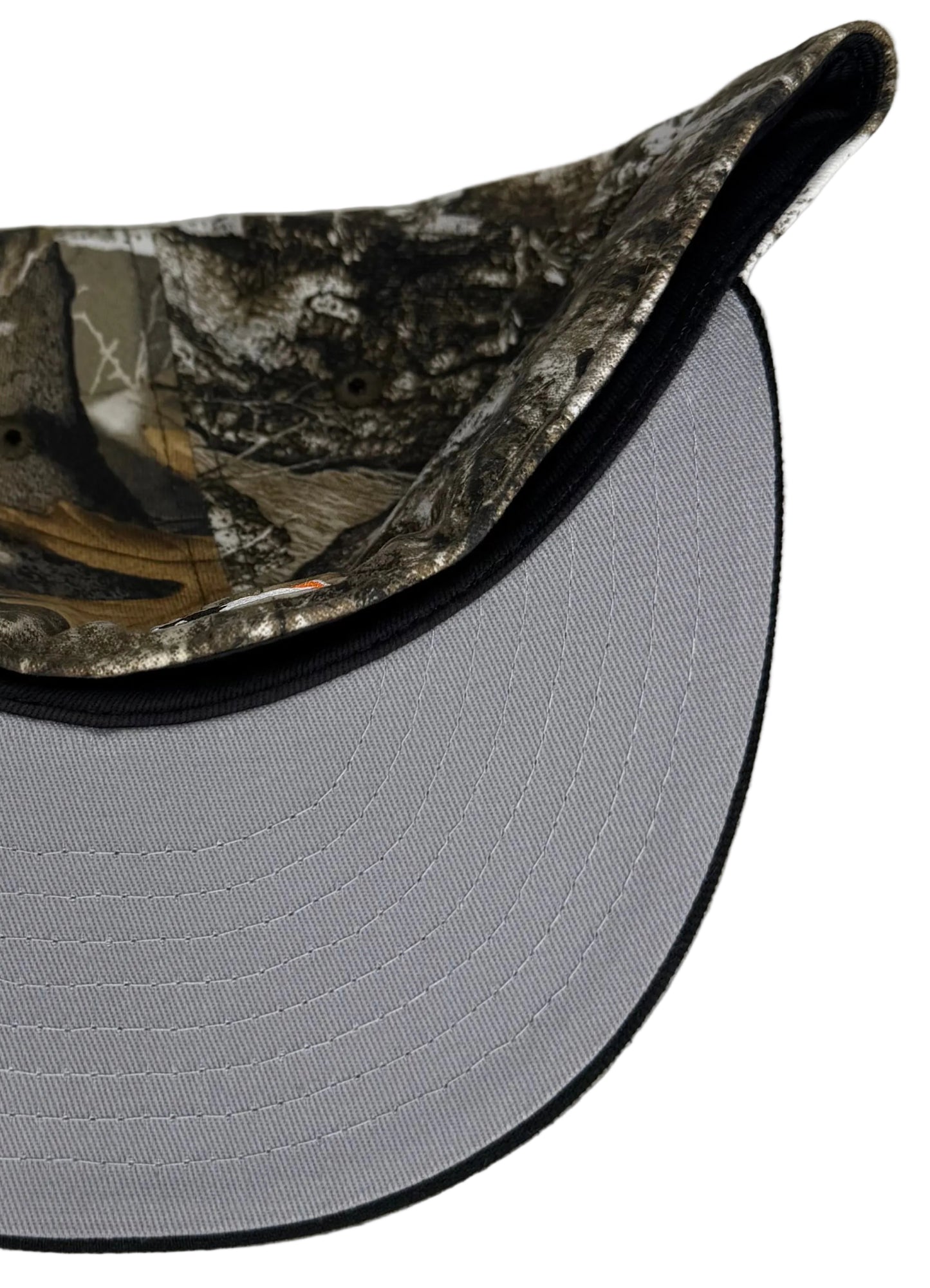 New Era 59Fifty fitted hat features a Realtree camo crown, a navy blue brim, and a special patch celebrating 40 years of the Houston Colt .45s