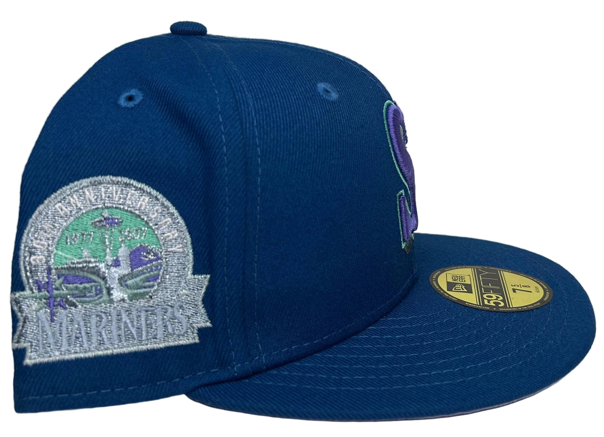 New Era 59FIFTY fitted Seattle Mariners “Lavender Fields” featuring a purple "S" front logo and a 30th-anniversary side patch.
